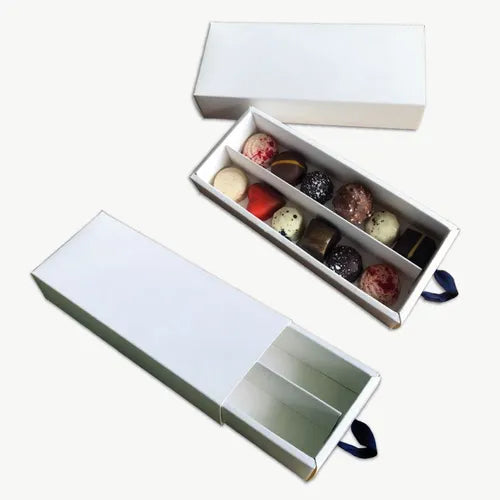 cod: 3107 (50u) CAJA PARA BOMBONES FOSFORERA DIVISOR 10-12 BLANCA - medida: 19x8x3.5